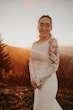 Bride Wearing Simple Long Sleeve Wedding Dress Called Bethany By Rebecca Ingram