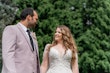 Bride wearing Nikki by Maggie Sottero looking at her husband