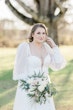 Modern Bride Wearing Mikado Mermaid Wedding Dress With Puff Sleeves Called Pippa By Rebecca Ingram