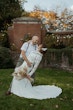 Bride Wearing Crepe Wedding Dress Called Dionne By Rebecca Ingram With Groom Dipping Her