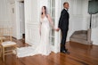 Bride wearing Bailey by Sottero and Midgley holding hands with her husband