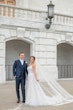 Bride wearing Marvine wedding gown by Sottero and Midgley with her husband