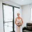 Bride wearing Mindel wedding dress by Maggie Sottero
