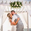 Groom With Bride Wearing Boho-Chic Lace A-Line Wedding Dress Courtney By Rebecca Ingram