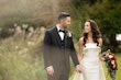 Bride wearing Mitchell Marie by Maggie Sottero with her husband