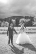 Bride Wearing Ballgown Wedding Dress Called Indiana By Maggie Sottero With Groom In A Field