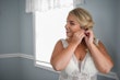 Bride Getting Ready Wearing Plunging Illusion Beaded Gown Called Elaine By Maggie Sottero 