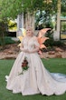 Bride Wearing Jaquard Wedding Dress Called Derrick Marie By Maggie Sottero With A Fairy Crown And Wings