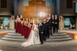 Real bride In White Wedding Dress Named Darius By Maggie Sottero Posing With Groom and Bridal Party In Church