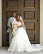 Groom With Bride Wearing White Lace Ball Gown