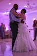 Bride wearing Danielle by Maggie Sottero dancing with her husband