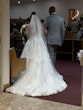 Bride Wearing White Lace Ball Gown 