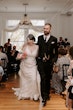 Bride Wearing Rustic Lace Wedding Dress Called Larkin Lynette By Rebecca Ingram Walking With Groom After The Ceremony