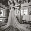 Bride Getting Ready Wearing Flowy Tulle Wedding Dress Called Mirra By Maggie Sottero