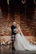 Bride wearing Lettie wedding dress by Rebecca Ingram with her husband