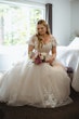 Bride Wearing Lace Aline Wedding Dress Called Harlem By Maggie Sottero Sitting