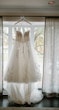 Lace Princess Dress Called Harlem By Maggie Sottero Hanging From A Window