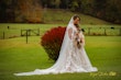 Bride wearing Kingsley wedding gown by Sottero and Midgley