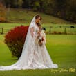 Bride wearing Kingsley wedding gown by Sottero and Midgley