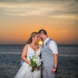 Groom With Bride Wearing Boho-Chic Lace A-Line Wedding Dress Courtney By Rebecca Ingram