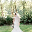 Bride Wearing a Classic Lace Wedding Dress Called Brenda by Rebecca Ingram
