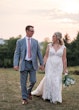 Groom With Bride Wearing Sultry Lace Cap Sleeve Wedding Dress Chauncey By Sottero And Midgley