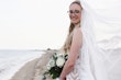 Bride wearing Davis Leigh wedding dress by Sottero and Midgley