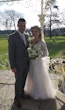 Bride In Long Sleeve Lace Wedding Dress Called Iris By Rebecca Ingram With Groom