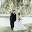 Groom With Bride Wearing White Lace A-line