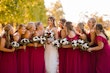 Bride wearing Hamilton wedding dress by Sottero and Midgley with her bridesmaids