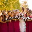 Bride wearing Hamilton wedding dress by Sottero and Midgley with her bridesmaids