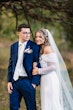 Bride Wearing Sheath Wedding Dress With Pearls Drew Marie By Maggie Sottero