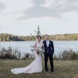 Bride with groom wearing budget friendly fit and flare wedding dress