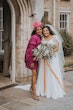 Bride wearing Lorraine by Rebecca Ingram with her friend