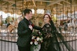 Bride Wearing Black Lace Wedding Dress Called Zander Lane By Sottero And Midgley With Groom Looking At Her