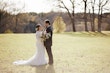 Groom Gazing at Bride in Geometric Allover Lace Wedding Dress with Sweetheart Neckline Called Dover by Maggie Sottero