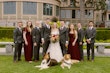 Bride wearing Laila wedding dress by Maggie Sottero with the bridal party