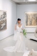 Bride wearing Moon by Maggie Sottero in a museum