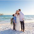 Bride wearing Johanna Lane wedding dress by Maggie Sottero with her family