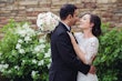 Groom With Bride Wearing White Lace Wedding Dress