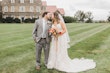 Groom With Bride Wearing Boho-Chic A-line Wedding Dress Courtney By Rebecca Ingram