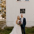 Bride Wearing Square Neck Long Sleeve Floral Wedding Dress Called Sawyer By Sottero And Midgley With Groom Outside