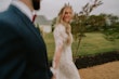 Groom With Bride Wearing Lace Sheath Wedding Dress Francesca By Maggie Sottero