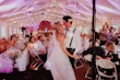 Groom With Bride Wearing A-Line Lace Wedding Dress Marisol By Rebecca Ingram