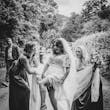 Bride wearing Lorraine by Rebecca Ingram with her friends