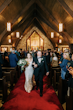 Bride Wearing Nature Lace Wedding Dress Called Albany By Maggie Sottero And Groom Walking Down The Aisle In A Chapel