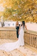 Bride Wearing Crepe Sheath Wedding Dress Called Alda By Rebecca Ingram With Mother