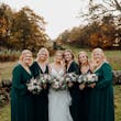 Bride wearing Lettie wedding dress by Rebecca Ingram with her bridesmaids