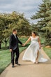 Real Bride In White Wedding Dress Named Theodora By Rebecca Ingram Walking With Groom