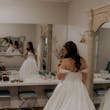 Bride Wearing Simple Ball Gown Wedding Dress With An Elegant Overskirt Called Kyrie By Maggie Sottero